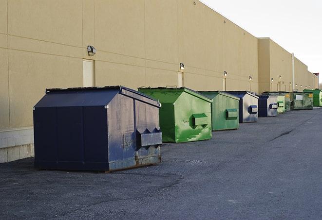 metallic dumpster units staged for construction garbage in Fort Salonga, NY